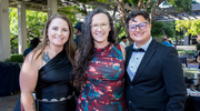 Ms. Suarez celebrates the evening with her wife, Carley La’akea-Suarez (right), and their friend, Cassidy Teaff (left).