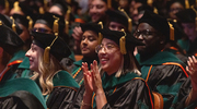 Milan Ho, M.D., is all smiles during the ceremony.