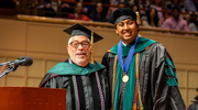 Charles Ginsburg, M.D., former Vice Provost and Senior Associate Dean for Education at UT Southwestern, presents the Ho Din Award to Prajwal Gowda, M.D. The Ho Din is the highest medical student honor given at UTSW, bestowed by Southwestern Medical Foundation.