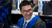 Cell and Molecular Biology graduate James Ye, Ph.D., flashes a smile awaiting the start of commencement.