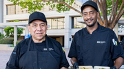 Two of several members of the Auxiliary Restaurant Group deliver an excellent catering experience.