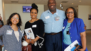 From left: Quarter Century Club members Dolores Santoyo, Demetria Wilson, Ulysses Johnson, and Nancy Cooper gather for a photo at the event.
