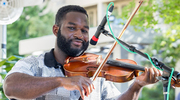 Violinist Banahene Glover, a UTSW medical student, hits just the right notes for a lovely event.