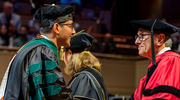 Matthew Cali, M.D., receives his diploma from Daniel K. Podolsky, President of UT Southwestern.