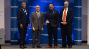 From left: Marc A. Nivet, Ed.D., M.B.A., Executive Vice President for Institutional Advancement; Dr. Podolsky; Mr. Macias, holding his award; and Hicham Ibrahim, M.D., Vice President and Senior Executive Officer of Ambulatory Services