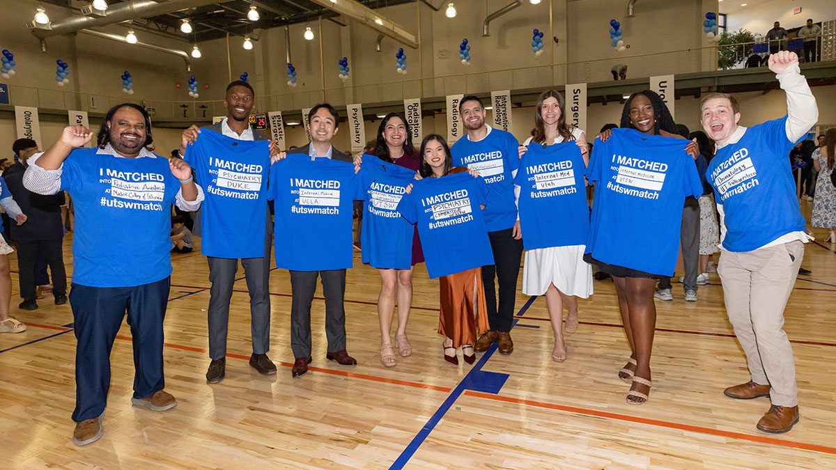 Nine students hold up their blue #utswmatch t-shirts, listing their individual matches.