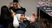 Qudsia Ali, M.P.H., beams with excitement as she prepares for commencement.