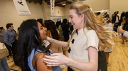 Meghana Gogineni, left, and Courtney Koplyay go in for a hug to celebrate this huge accomplishment.