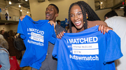 Chijindu Iheanacho, left, and Zureyat “Tammy” Sola-Odeseye cheer after finding their matches!