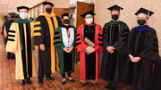 UT Southwestern and School of Health Professions leaders come together after the commencement ceremony.
