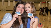Nina Velasco Meer, left, and Christina Colletti know there’s nothing sweeter than a Match Day cookie.