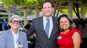 Human Resources colleagues take in the festivities. From left: Ann Chisholm, Manager, HR Project Management Office; Mr. Falke; and Martha Washington, Assistant Vice President, HR Services.