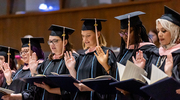 Graduates proudly recite the School of Public Health Oath, affirming their commitment to public health excellence.