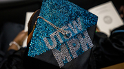 A graduation cap that reflects the spirit of the day’s achievement.
