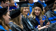 Clinical Psychology graduate Karen Meltzer, Ph.D., (right) shares a laugh with her mentor, Laura Howe-Martin, Ph.D. (left).