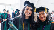 Anusha Naeem, M.D., (left) and Pooja I. Kumar, M.D., M.P.H., are all smiles following the ceremony.