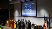The commencement ceremony opens with the playing of the national anthem.