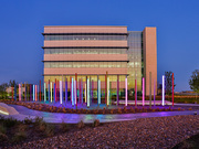 During the day, the painted steel poles dominate the experience; at night, LEDs prevail.