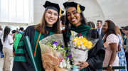 For Natalie Gault, M.D., (left) and Arushii Nadar, M.D., M.P.H., there is nothing better than a bouquet to commemorate the accomplishment.