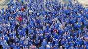 UTSW walkers wave as they assemble for the annual group shot.