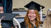 Eunice Huan, M.P.H., beams with excitement before the start of the ceremony.