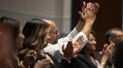Audience members show their encouragement and appreciation for all of the Pinnacle Award recipients.