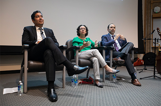 people sitting on stage