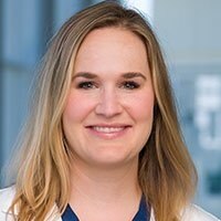 Kristina Goff, M.D., white woman, blonde hair, wearing medical coat