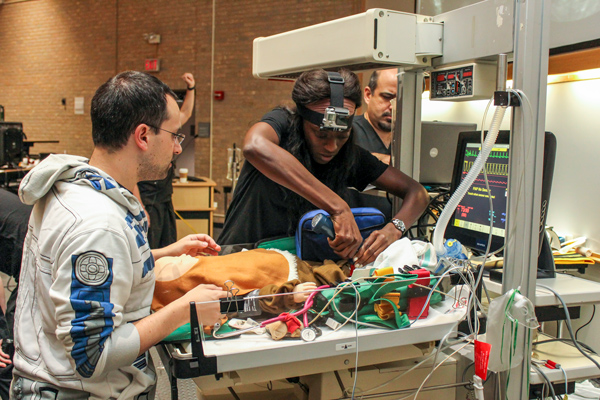 Students practicing emergency medicine procedures