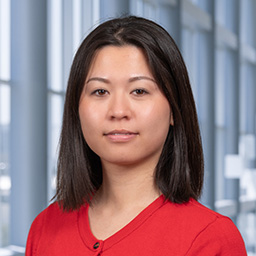headshot of Sian Jin wearing a red shirt