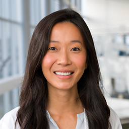 Dr. Cynthia Wei wearing a white lab coat standing in the Clements University Hospital lobby