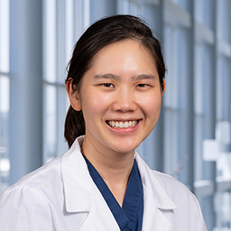 Dr. Krystal Lai wearing a lab coat