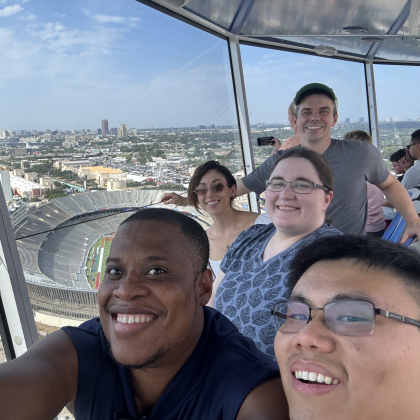 Fellows at the State Fair five people above city