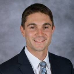 Headshot of Adam Dinoff, M.D., M.S.