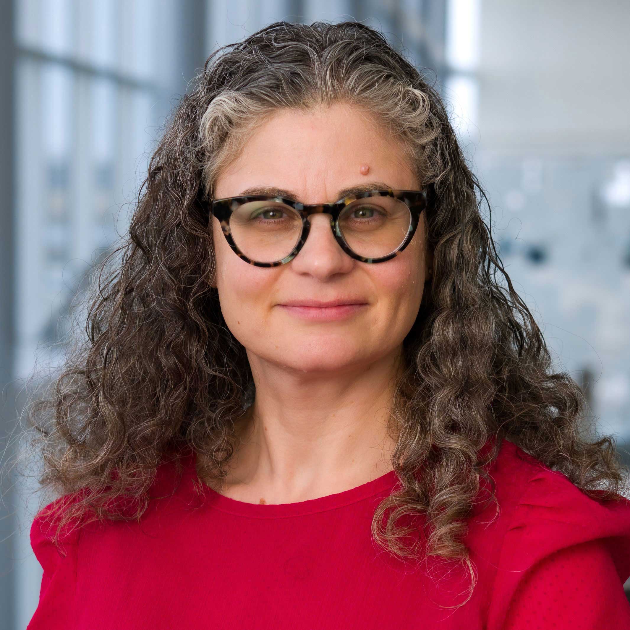Headshot of Adriane dela Cruz, M.D., Ph.D.