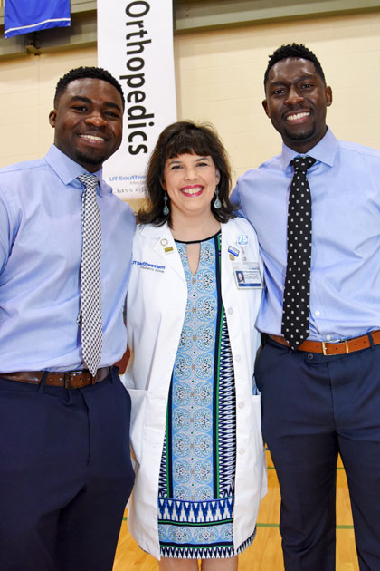 Angelica Mihalic, M.D. with two students on Match Day. Angelica Mihalic, M.D. with two students on Match Day