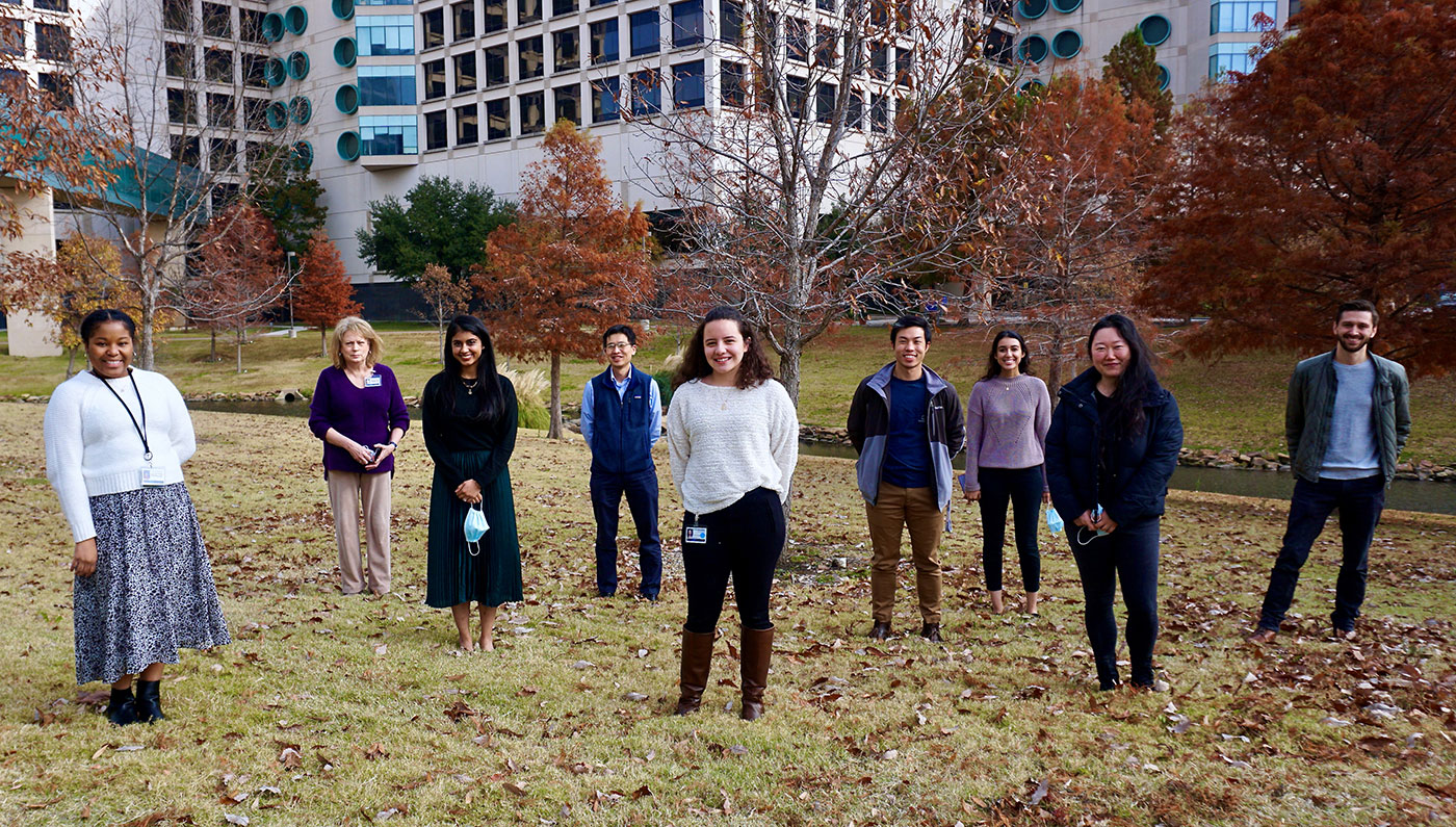 nine people in a field