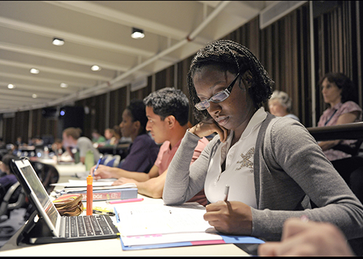 Shanica Pompey and Fellow Students Students taking notes in lecture hall