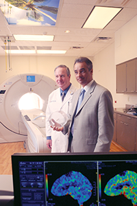 Phil Evans and Mike Medina Phil Evans and Mike Medina pose in MRI suite