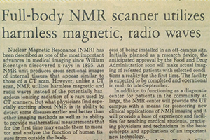 Newspaper article about nuclear magnetic resonance Newspaper article with headline Full-body NMR scanner utilitzes harmless magnetic, radio waves