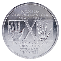 Commemorative Coin for Centennial of the X-Ray Coin depicting hand and x-ray of hand