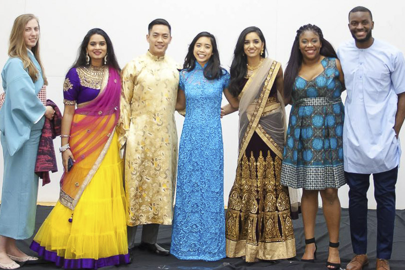 Students dress in traditional cultural attire. Students dress in traditional cultural attire.