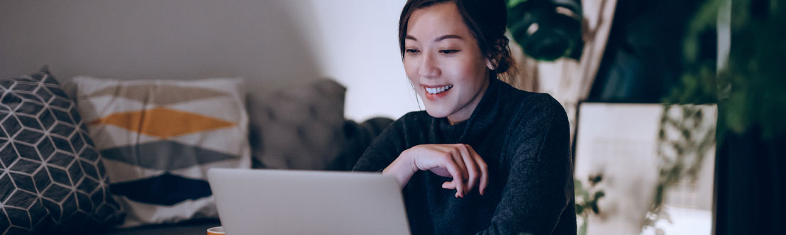 woman at home working on a laptop