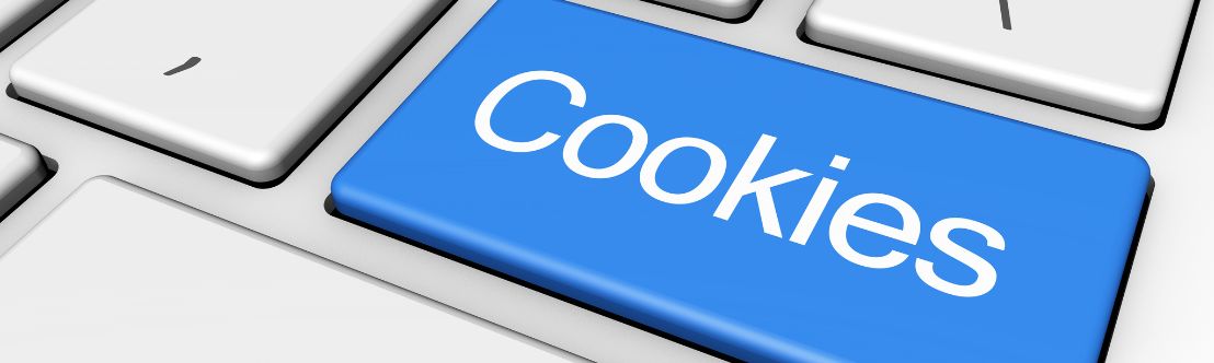 Close up of blue cookies key on a white computer keyboard