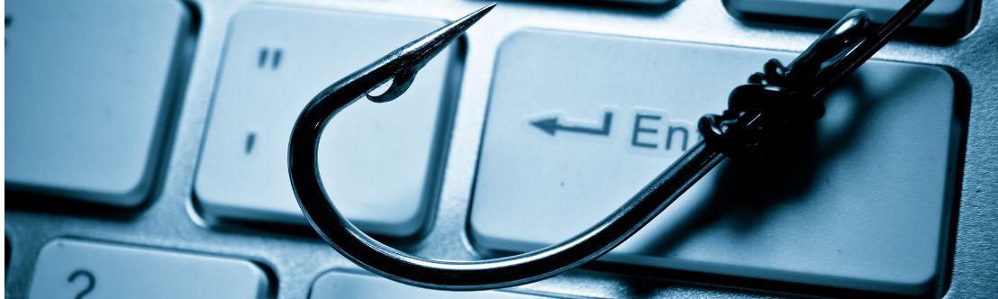 Close up of hands typing on computer keyboard with overlay of envelope icons