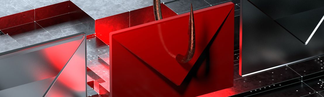Metal fishhook piercing a red envelope