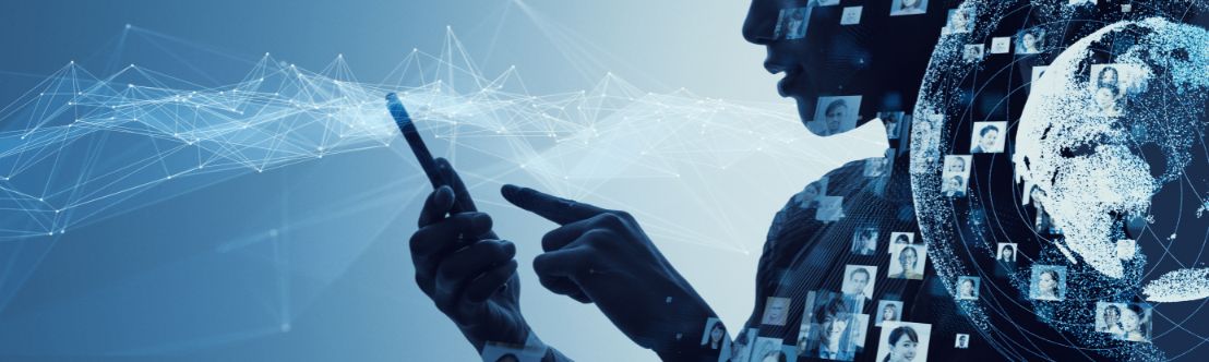 Silhouette of person using a smartphone