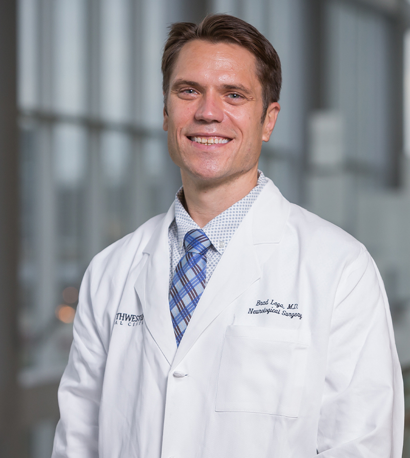 Bradley Lega, M.D. A man with brown hair and blue tie