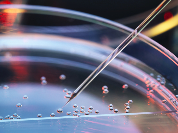 Pipette tip and bubbles on a smooth surface