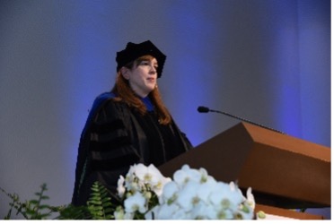 A microscope image Lora Hooper, Ph.D.